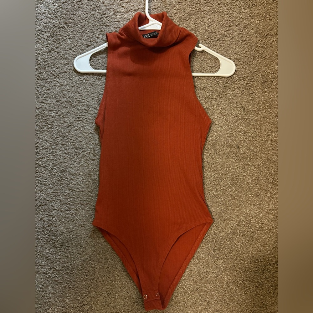 Rust Sleeveless Turtleneck Bodysuit
